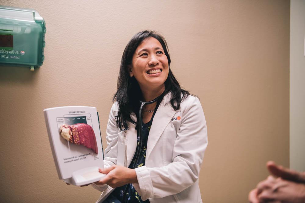 Dr. Kuang showing a medical display